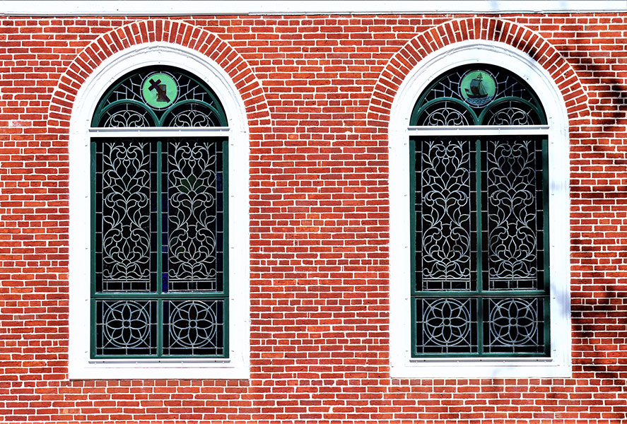 stained window on brick wall